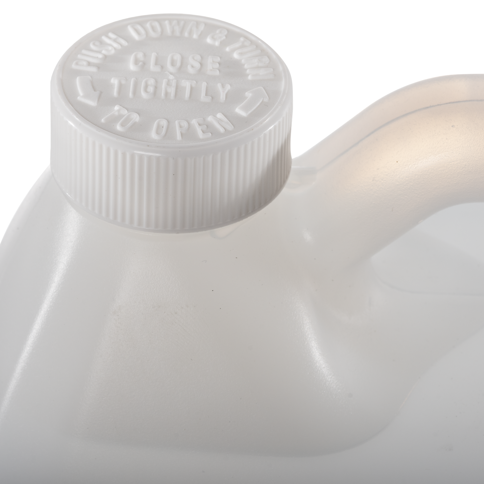 Plastic gallon jug with white twist on cap. Close up picture of cap.