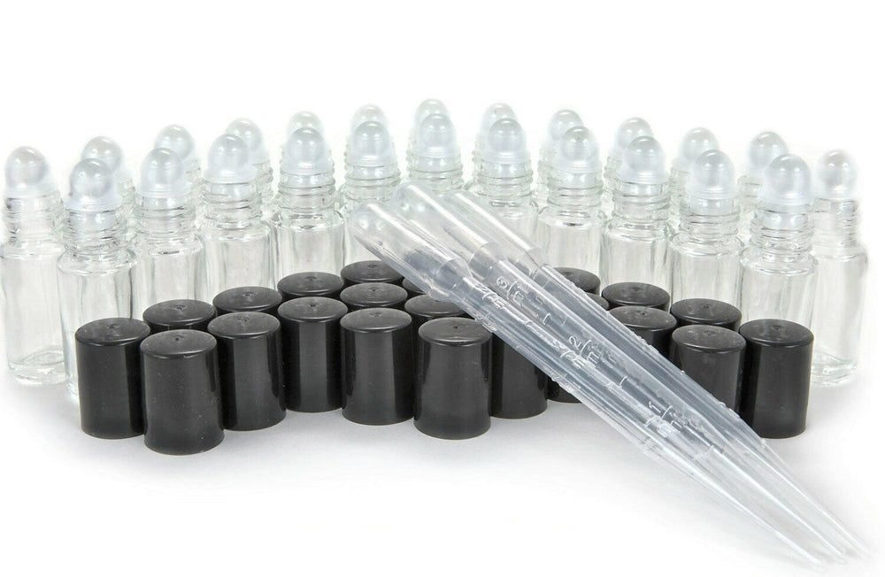 Picture displays 12 refillable 1.3 OZ glass roll-on kit with cylindrical glass bottle and glass ball attached. Contains 12 plastic twist on caps to close. This image also displays pipettes that will be included with the bottles.