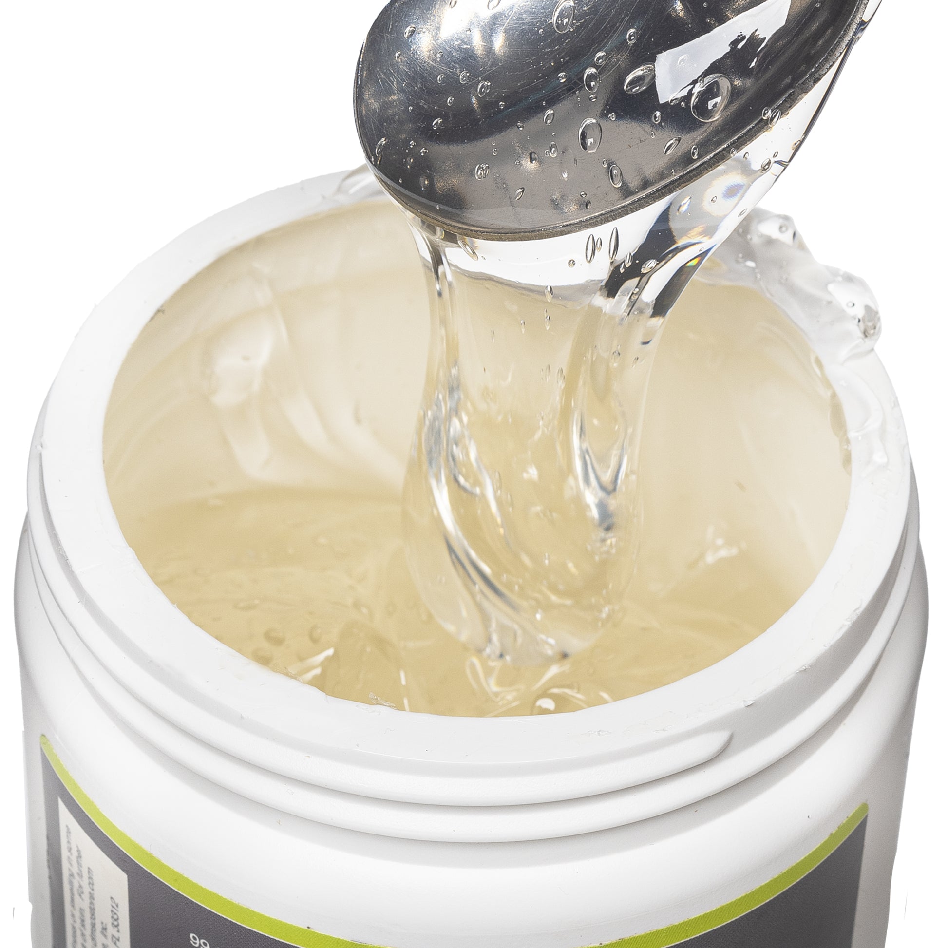 DMSO-aloe-Gel-dimethyl-sulfoxide-buy-best-Closeup. Opened view of the 4 oz 70/30 Aloe Vera gel jar. Contents revealed is the Aloe Vera gel product. Product is being scooped upwards with a spoon to show consistency.