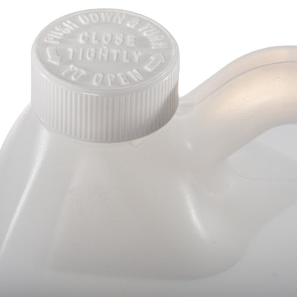 DMSO-liquid-99.995-arthritis-relief-gallon-plastic-lid-dimethyl-sulfoxide. Plastic gallon jug with white twist on cap. Close up picture of cap.